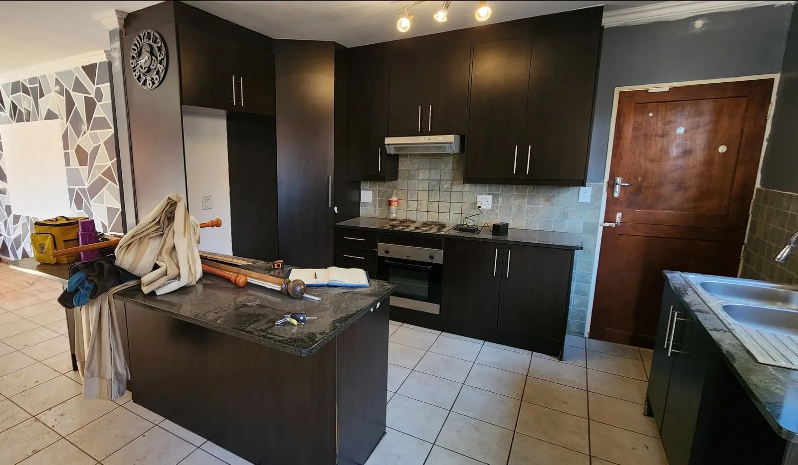 A study in graphite: the kitchen before its transformation.