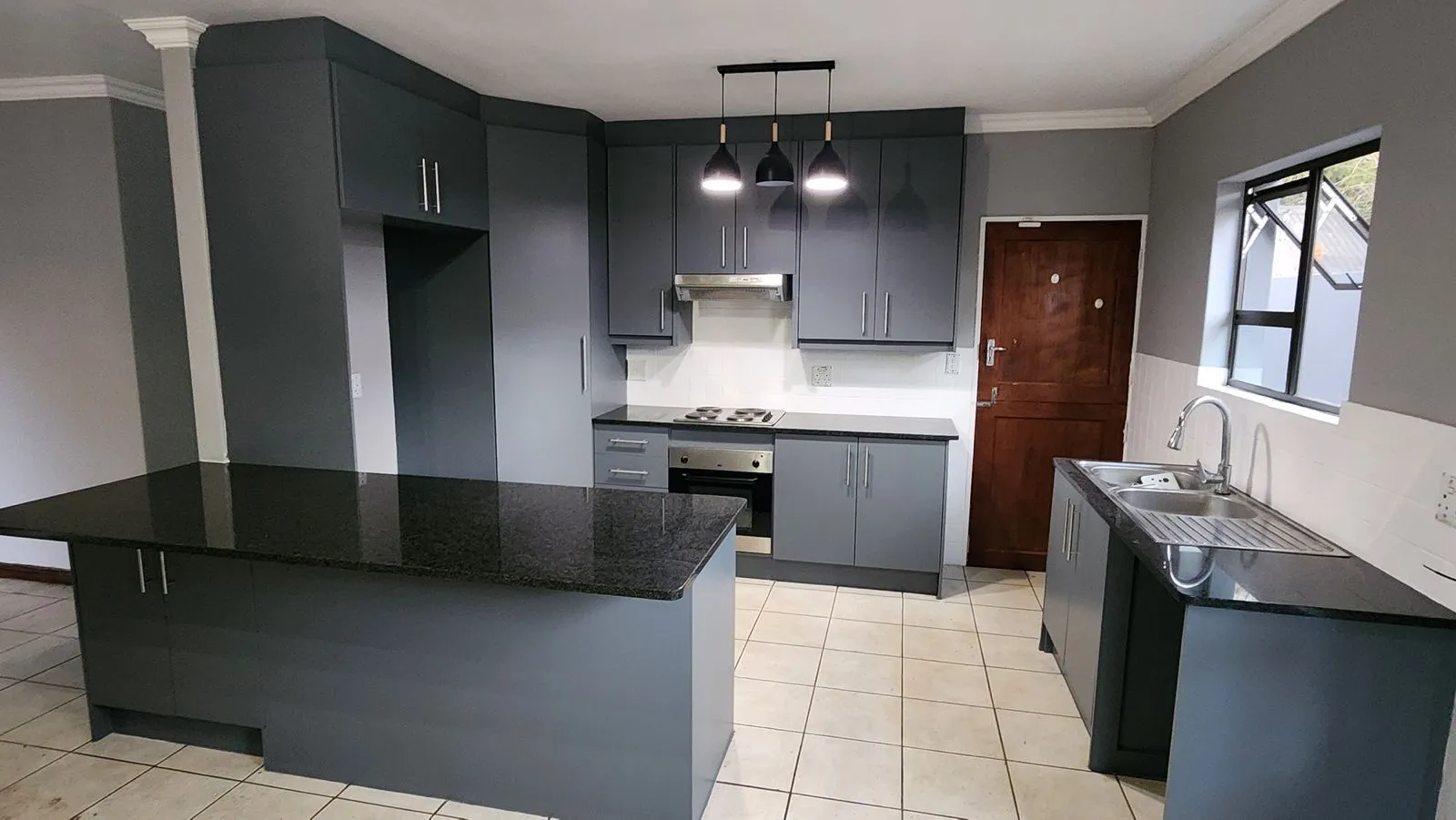 A study in graphite: the finished kitchen.