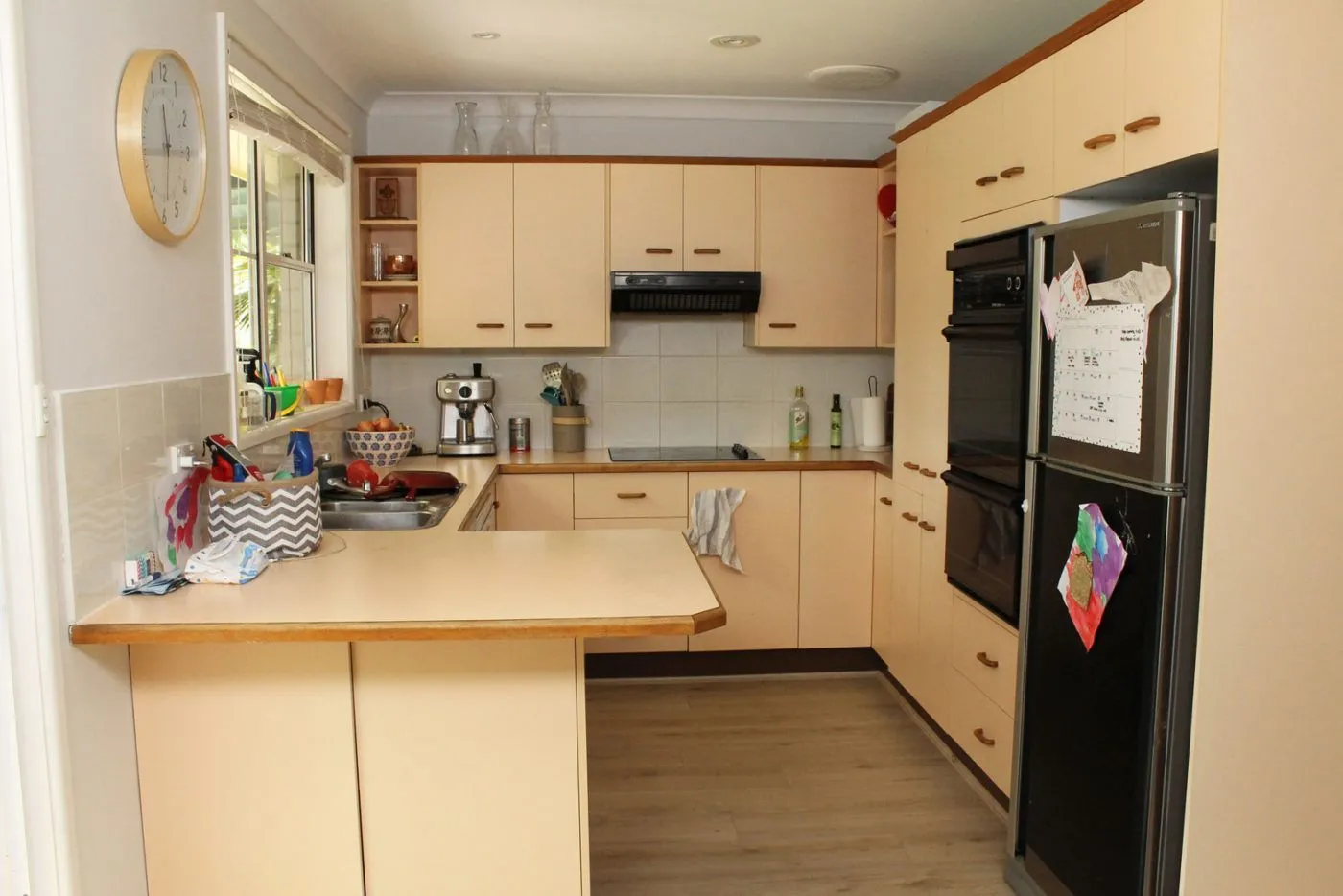 Two tones, one fresh start: the kitchen before its transformation.
