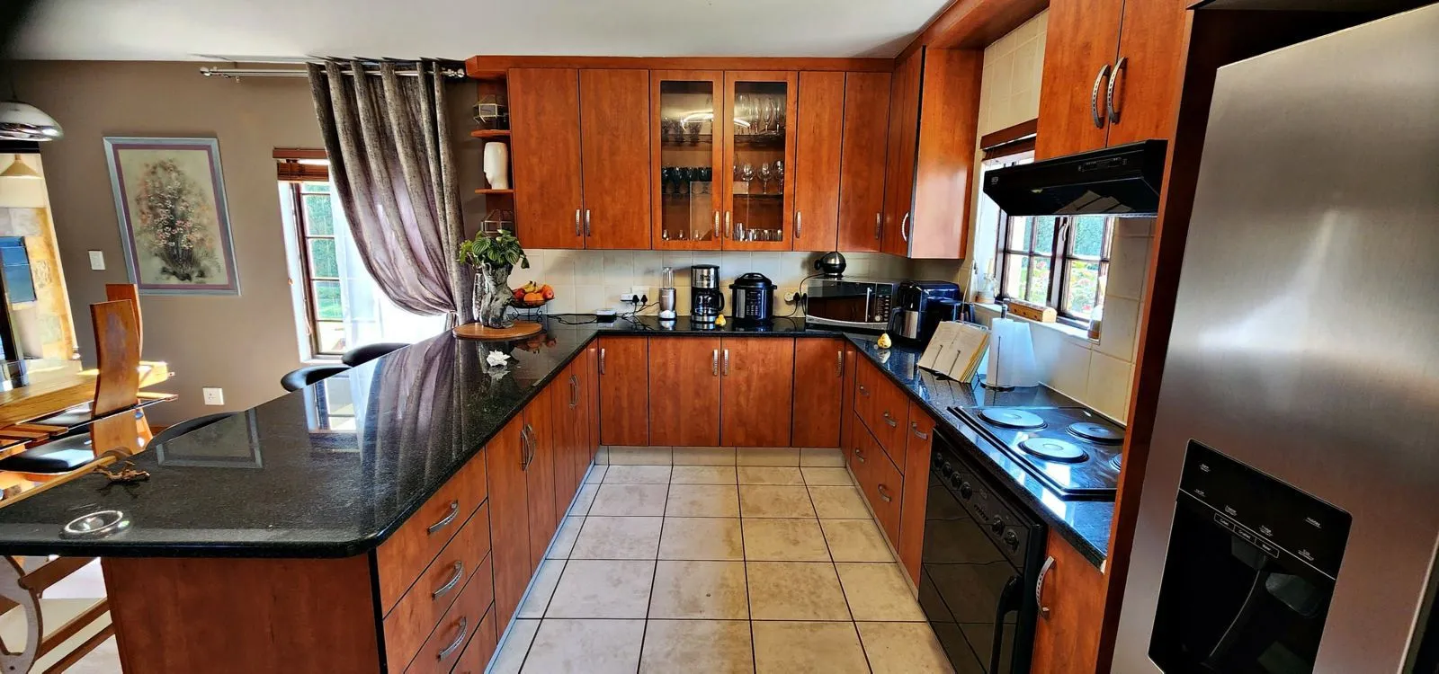 From timber to soft blue: the kitchen before its transformation.