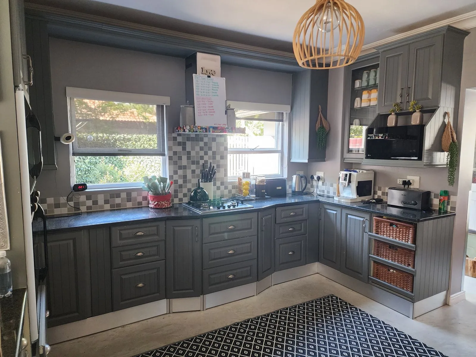 Sage, with a little character: the kitchen before its transformation.