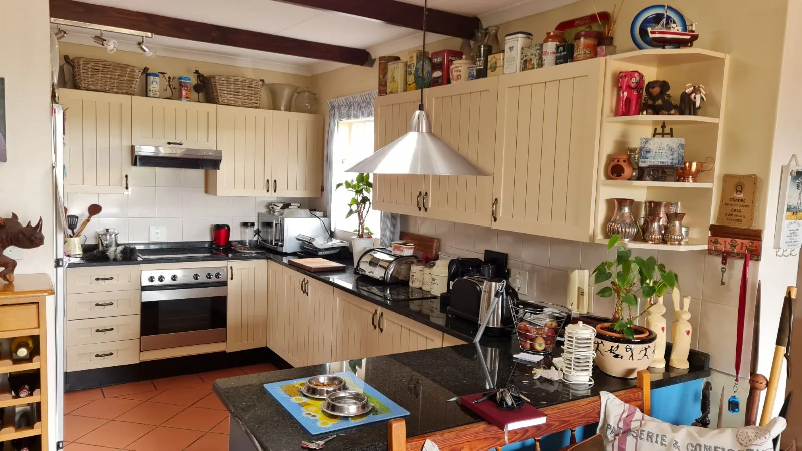 Colour, beautifully considered: the kitchen before its transformation.