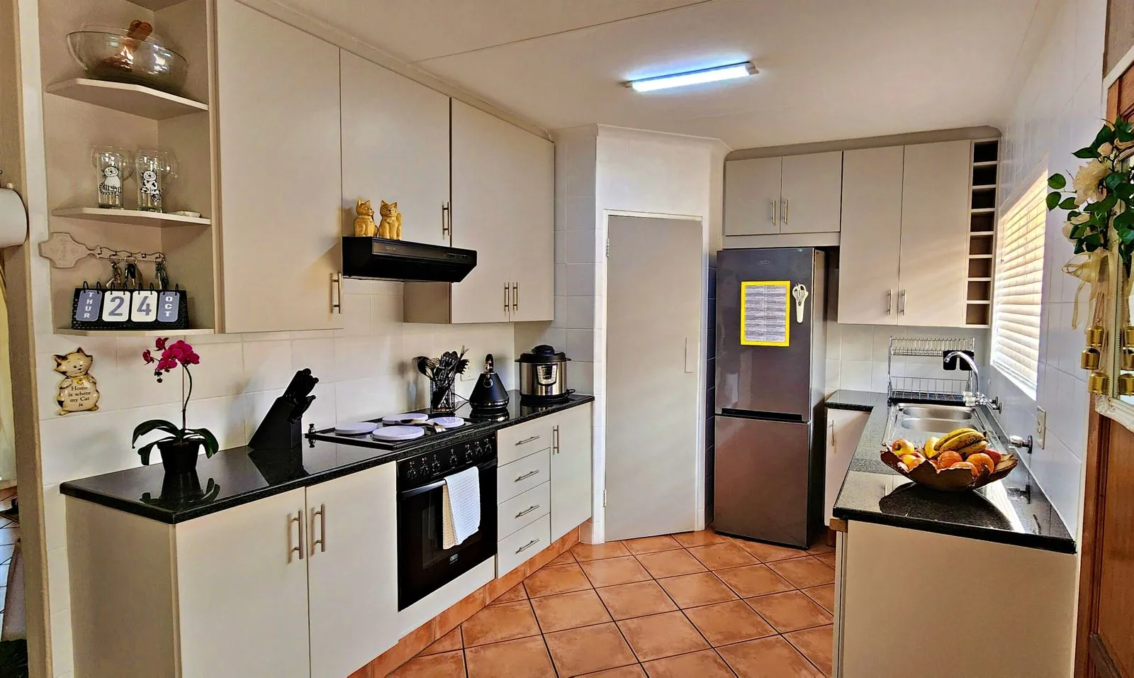 Fresh paint. Familiar home.: the finished kitchen.