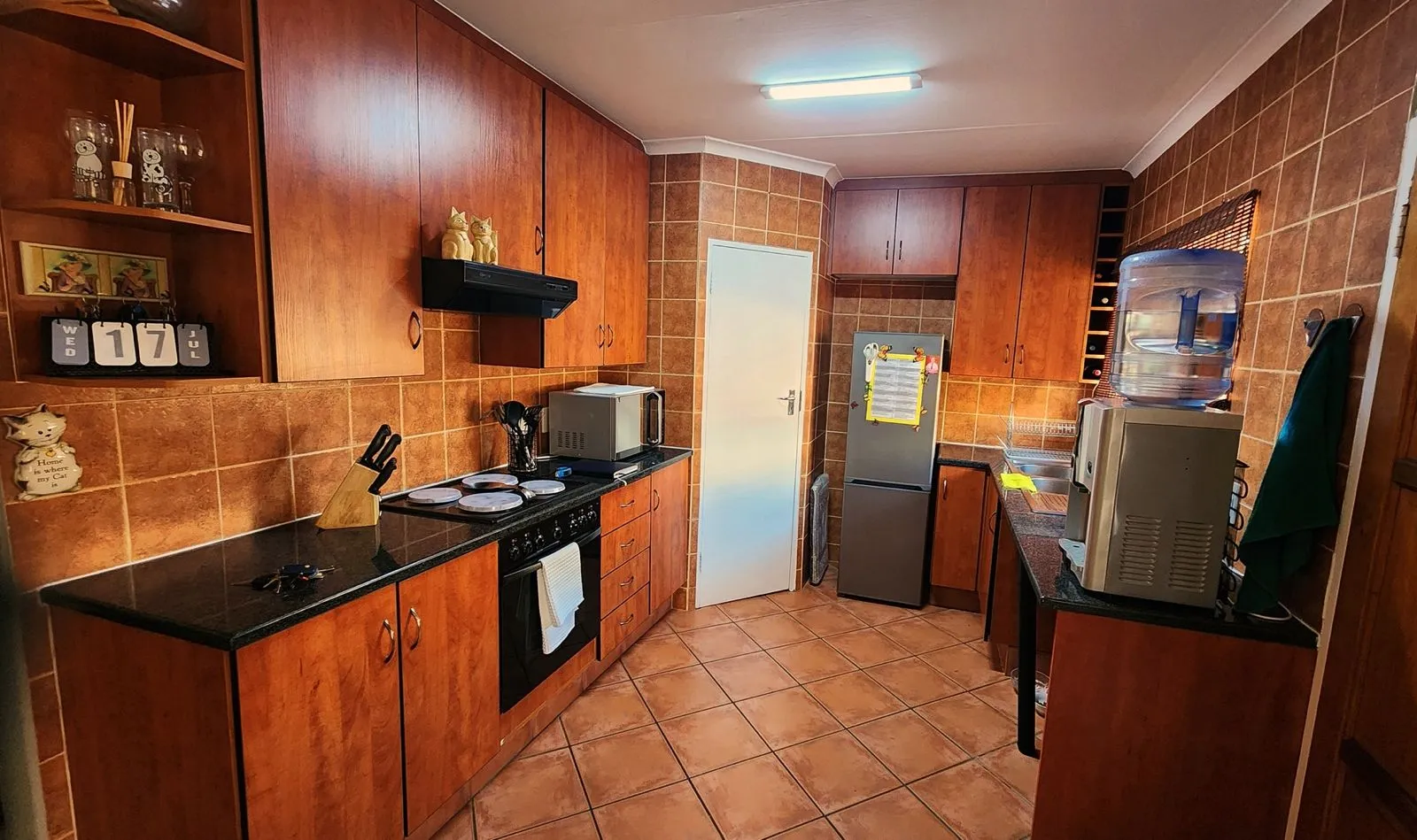 Fresh paint. Familiar home.: the kitchen before its transformation.