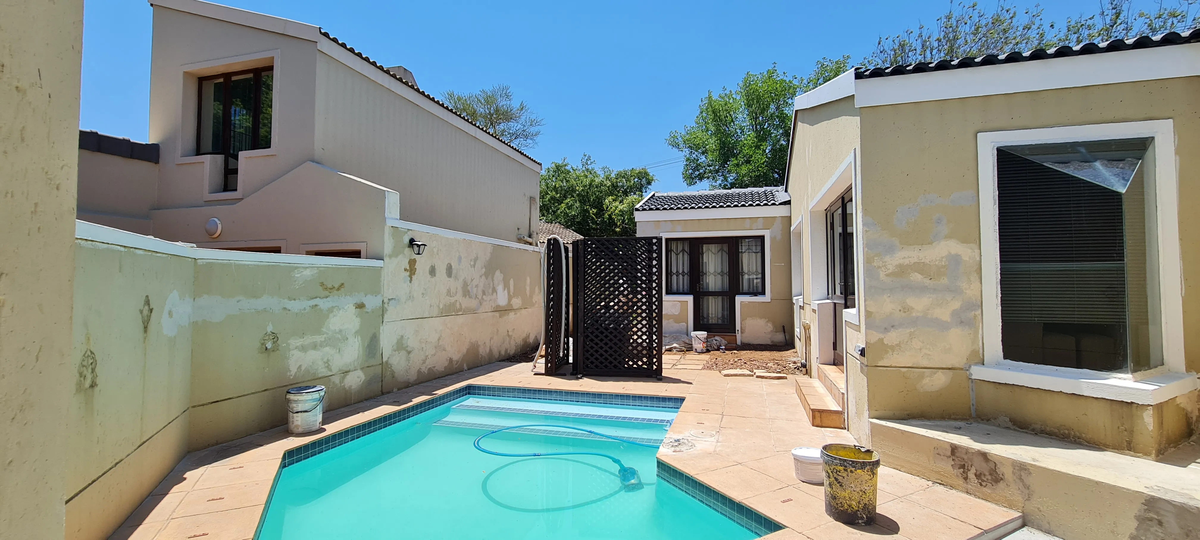 A new outlook: before · along the pool.